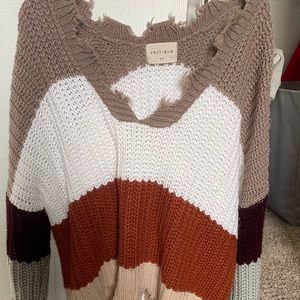 Worn maybe twice. Long sleeve distressed sweater